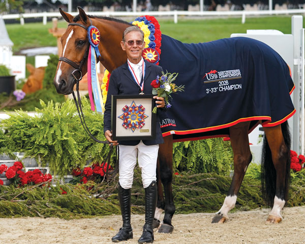 John French standing beside O’Rockstar with a championship ribbon and trophy