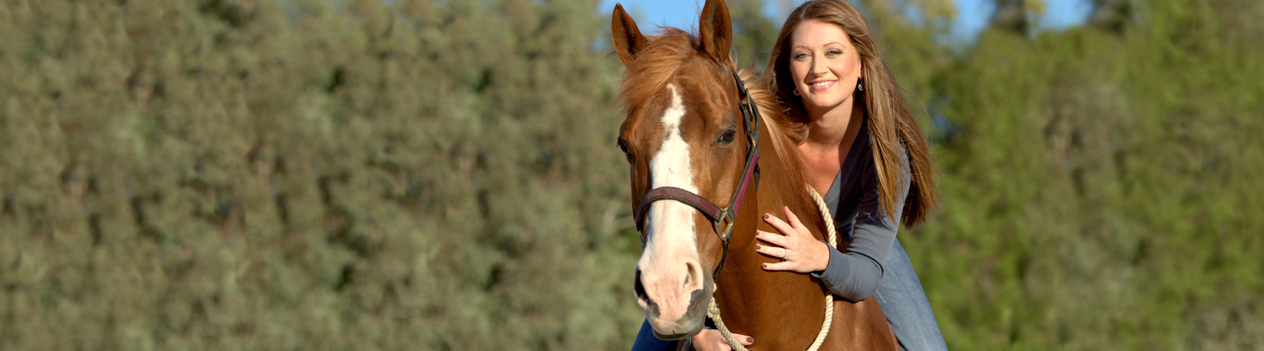 Platinum Advisor, Kelly, on her horse